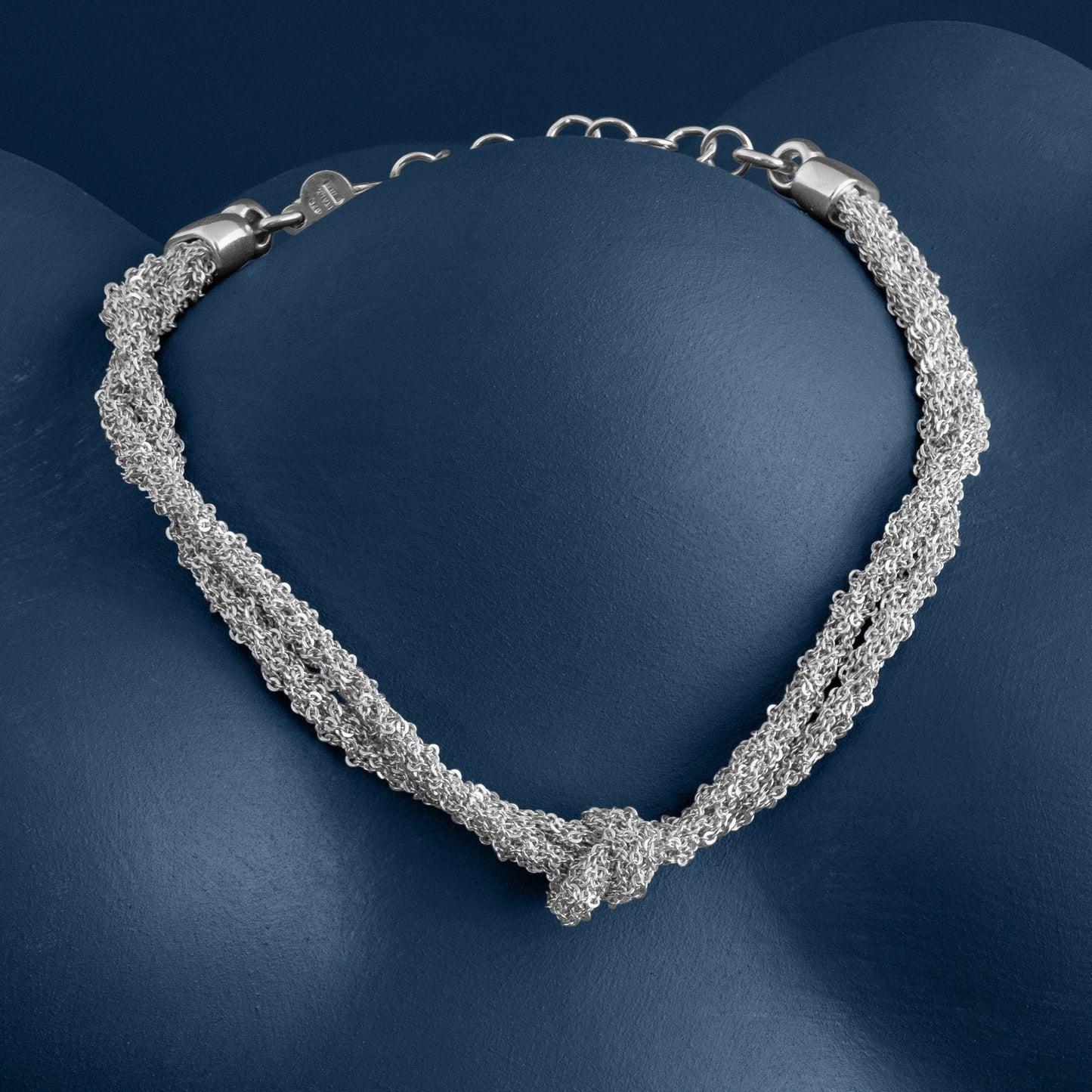 SILVER WOVEN THREAD DOUBLE KNOT BRACELET