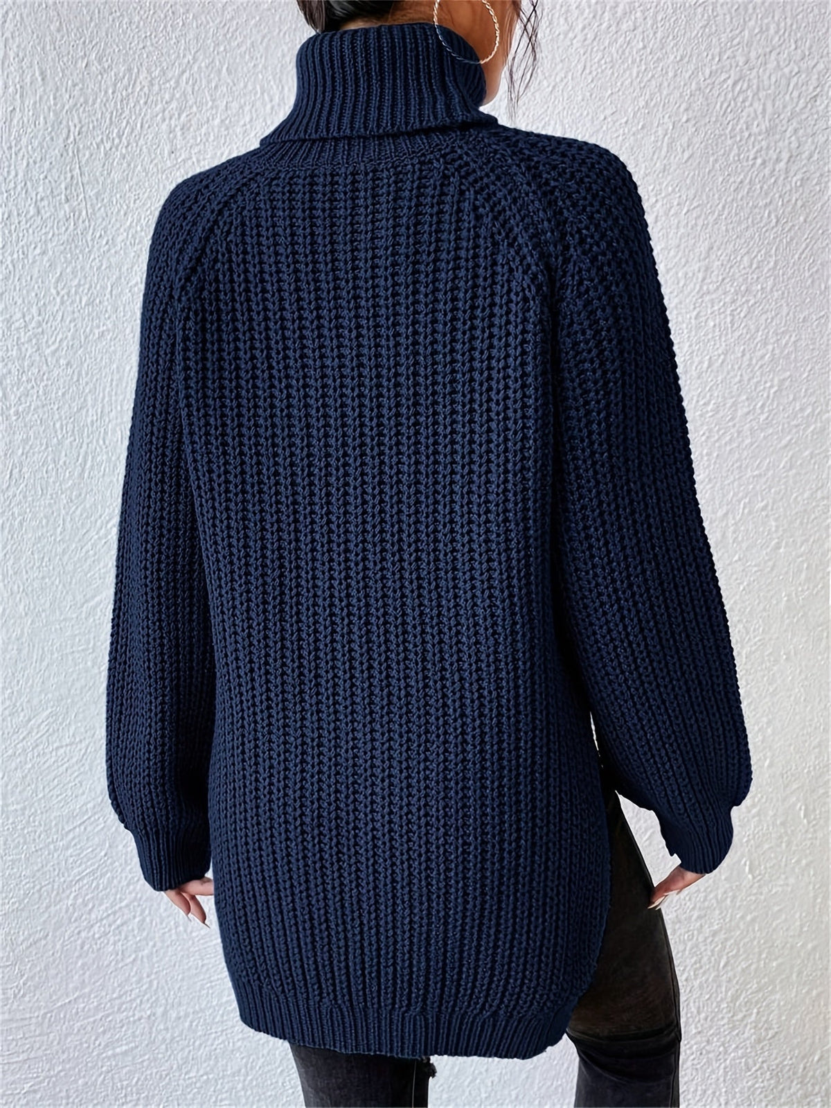 Jersey de cuello alto con aberturas en el bajo