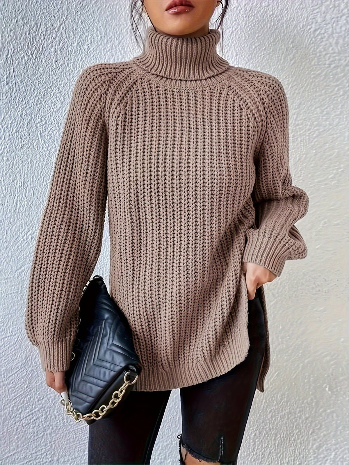 Jersey de cuello alto con aberturas en el bajo
