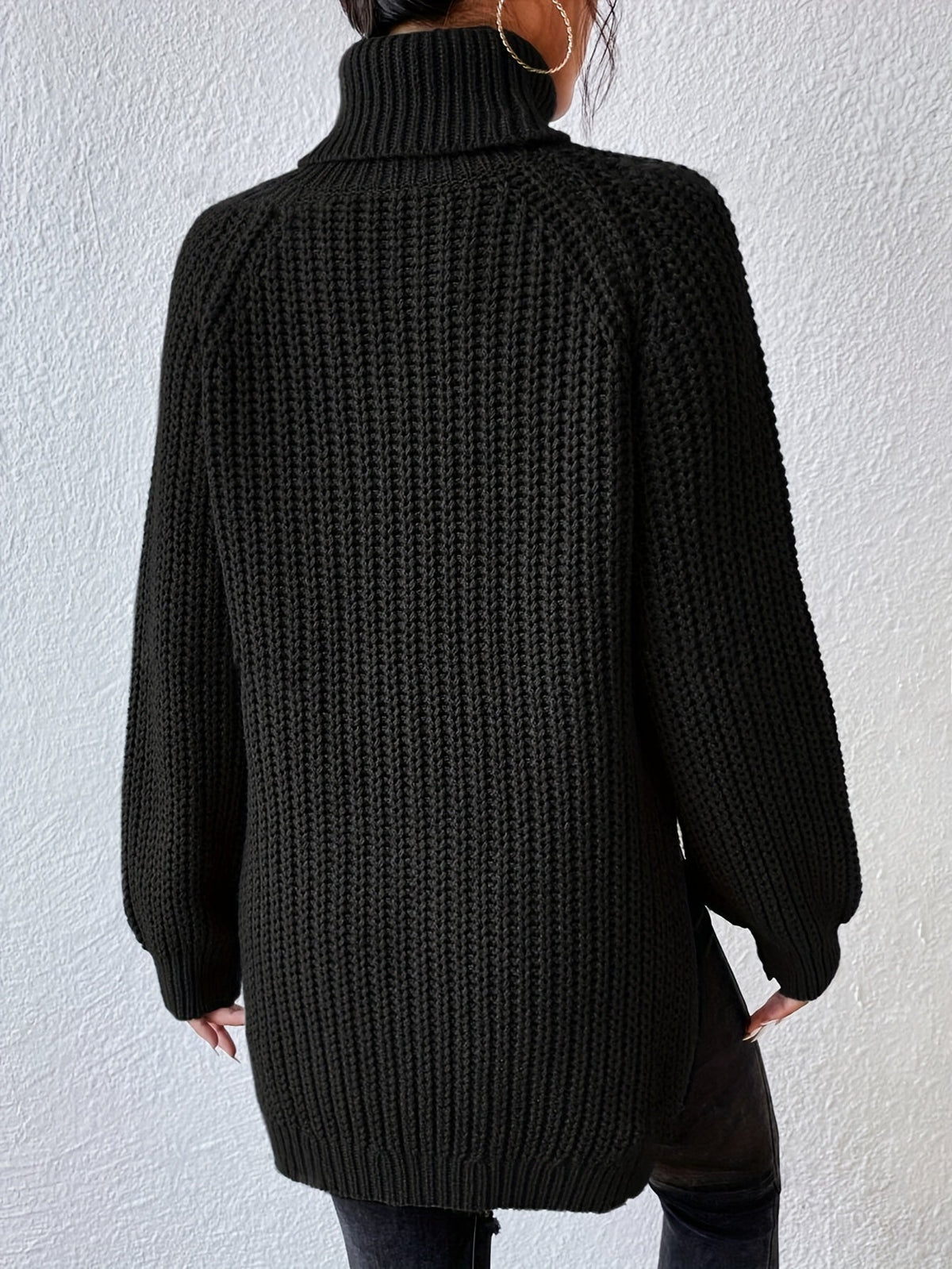 Jersey de cuello alto con aberturas en el bajo