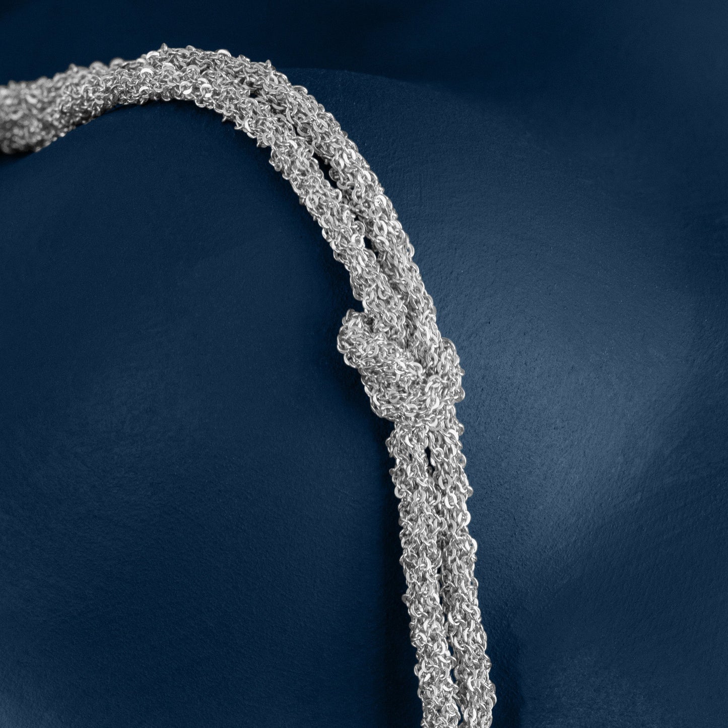 SILVER WOVEN THREAD DOUBLE KNOT BRACELET