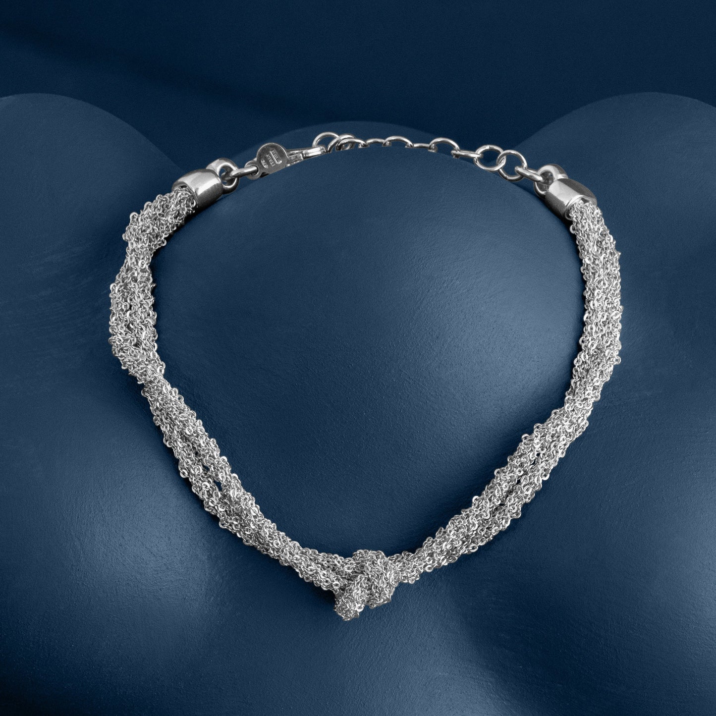 SILVER WOVEN THREAD DOUBLE KNOT BRACELET