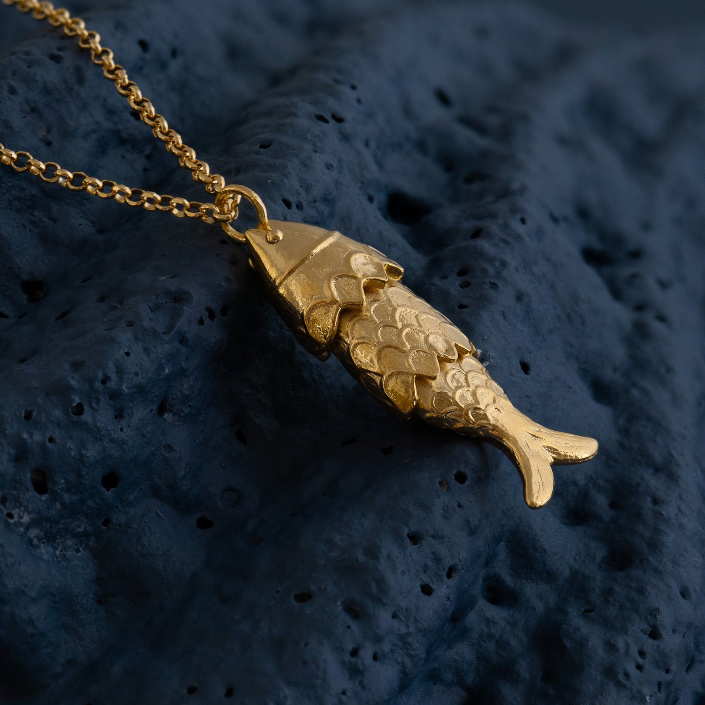FISH PENDANTS IN GOLD AND SILVER