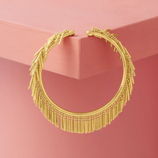 GOLD TASSEL BANGLE