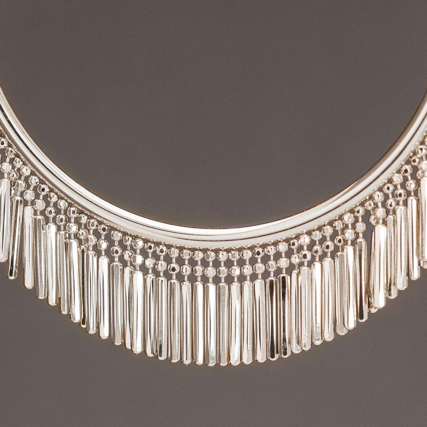 SILVER TASSEL BANGLE