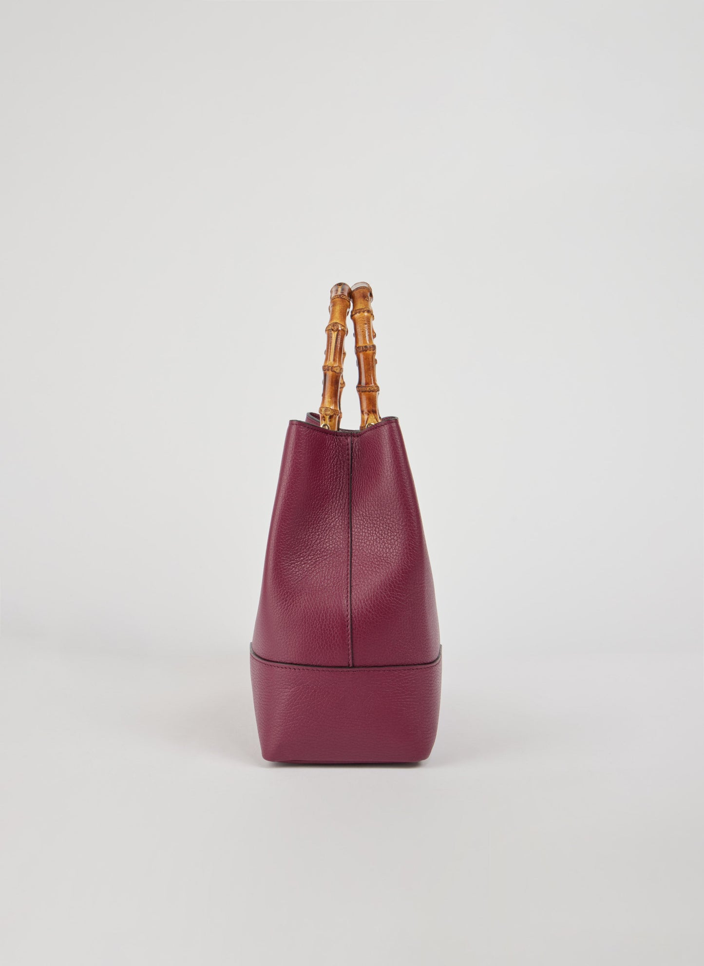 BOLSO DE ANTE CON ASA DE BAMBÚ