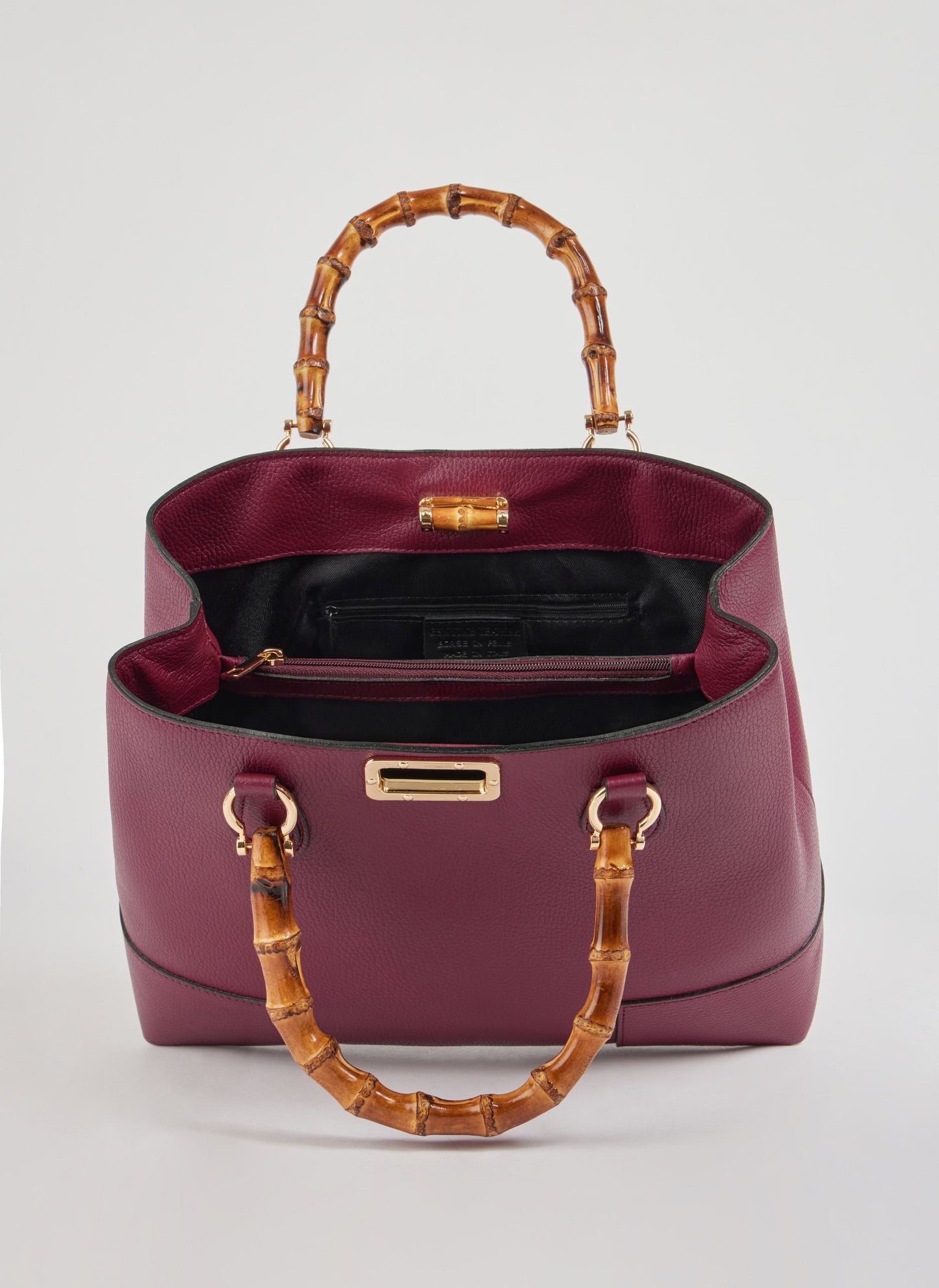 BOLSO DE ANTE CON ASA DE BAMBÚ
