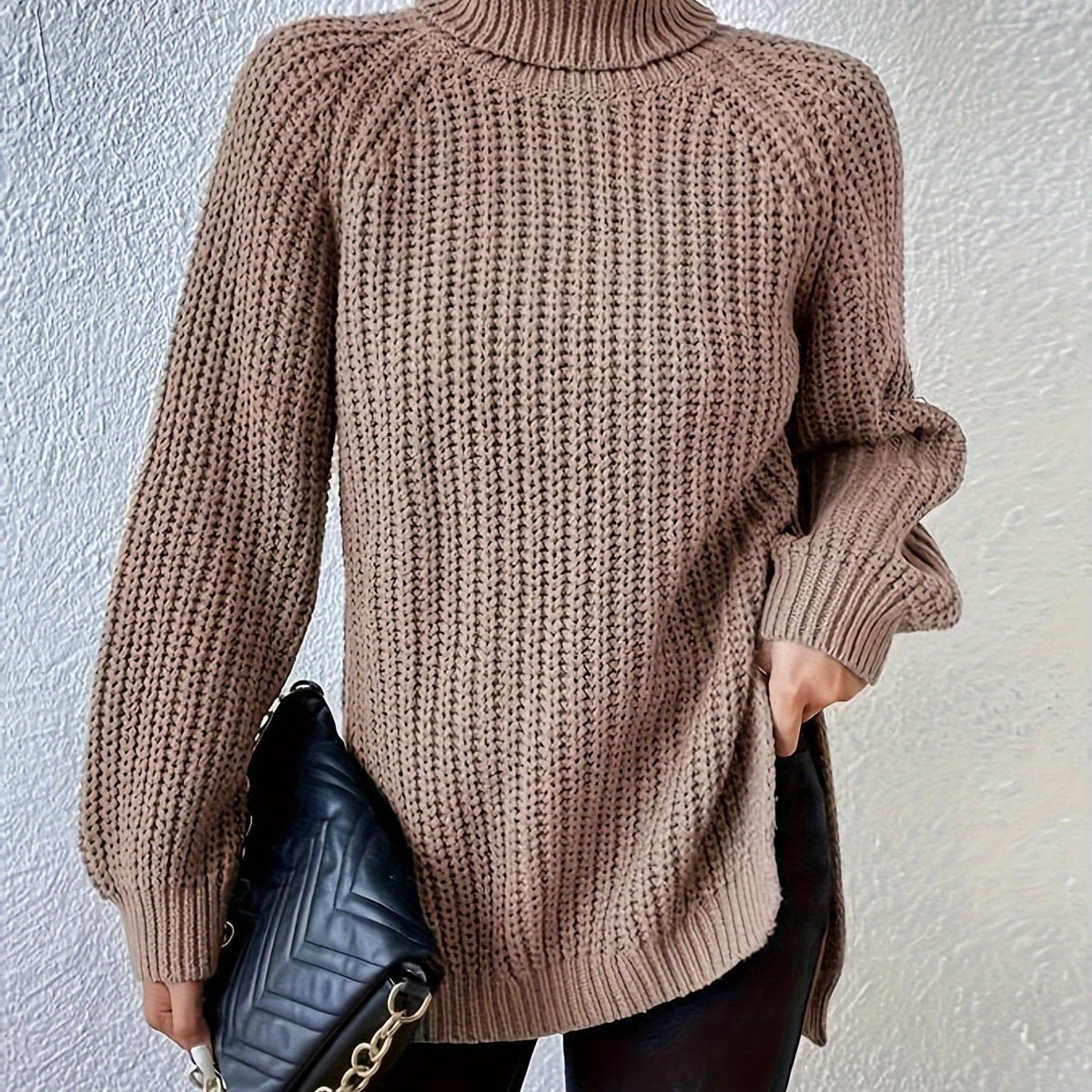 Jersey de cuello alto con aberturas en el bajo