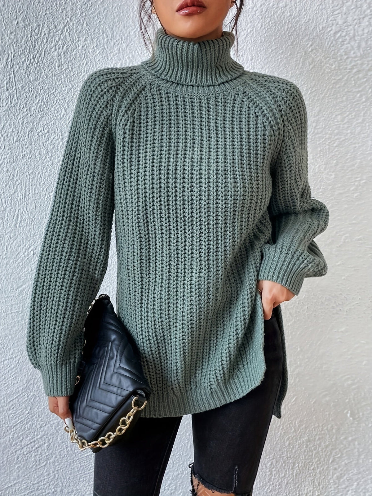Jersey de cuello alto con aberturas en el bajo